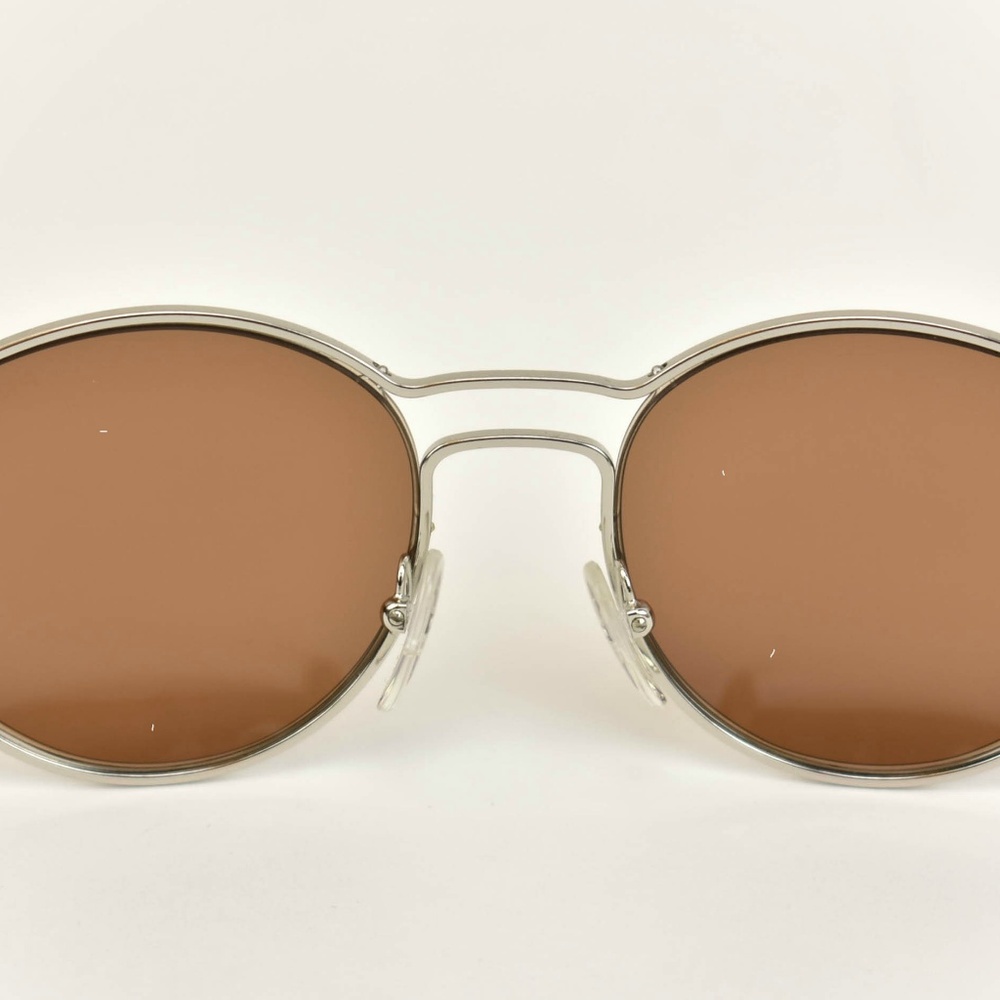 PRADA: Silver, Metal & Logo Sunglasses (po) - Picture 8 of 8